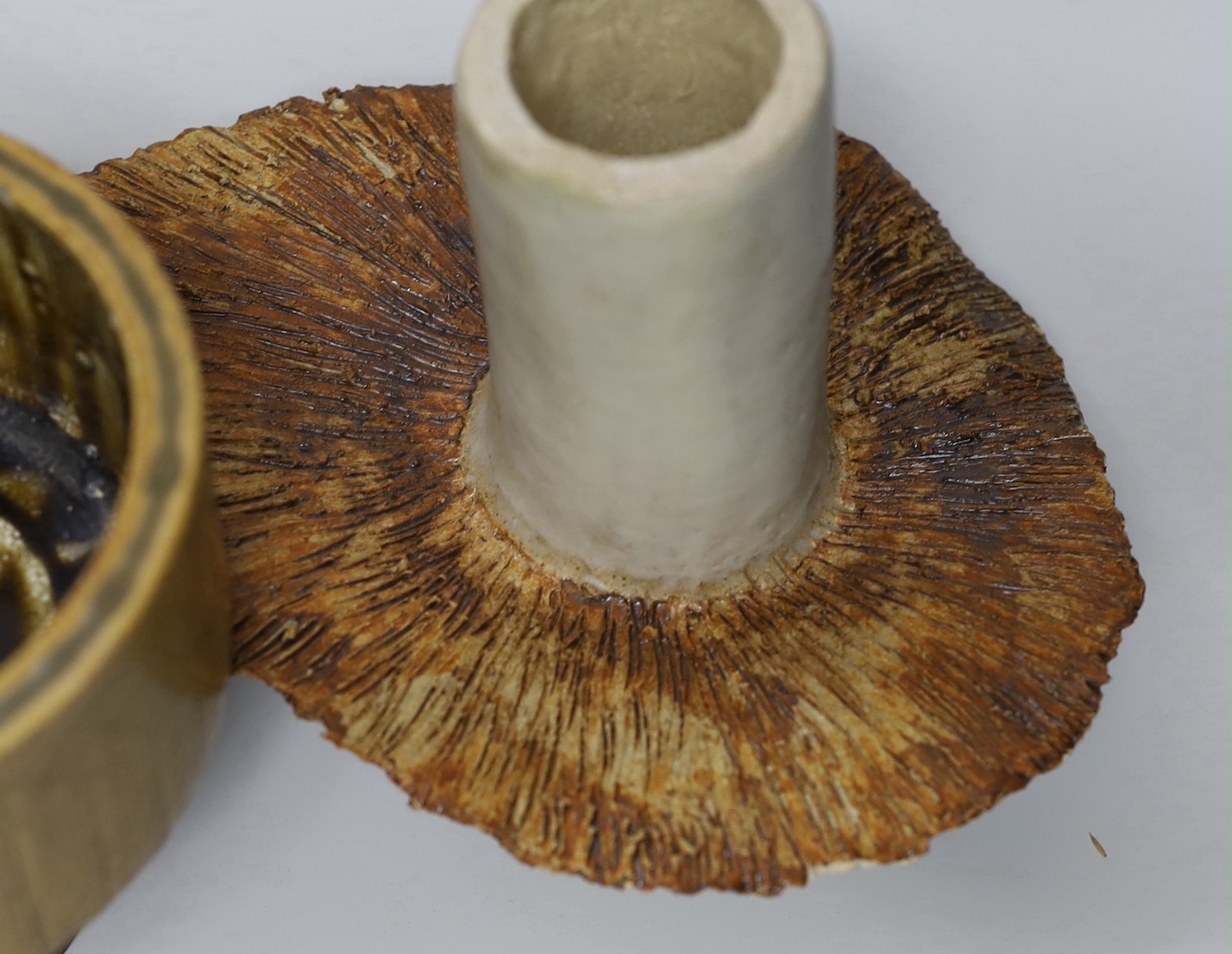 Ruth Sulke - two studio glazed stoneware ‘mushroom’ vases, together with a small studio pottery jardiniere, tallest 21cm